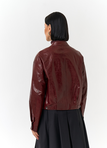 Куртка из натуральной кожи бордового цвета
